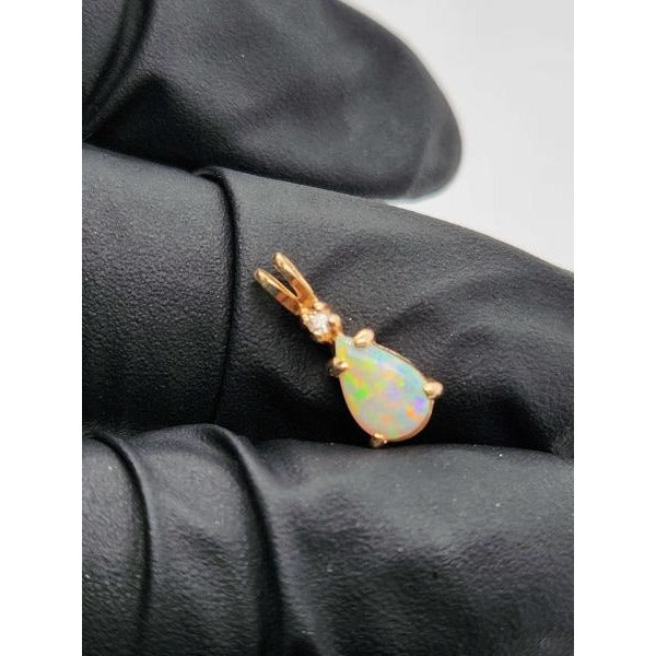 14kt Yellow Gold 8x5MM Pear Shaped Opal Pendant w/ .04 ctw Diamond Accent