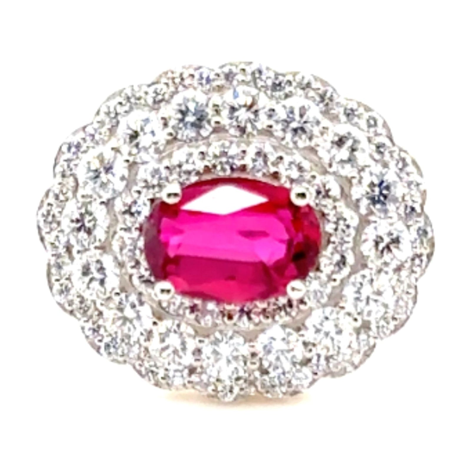 Red gemstone halo ring