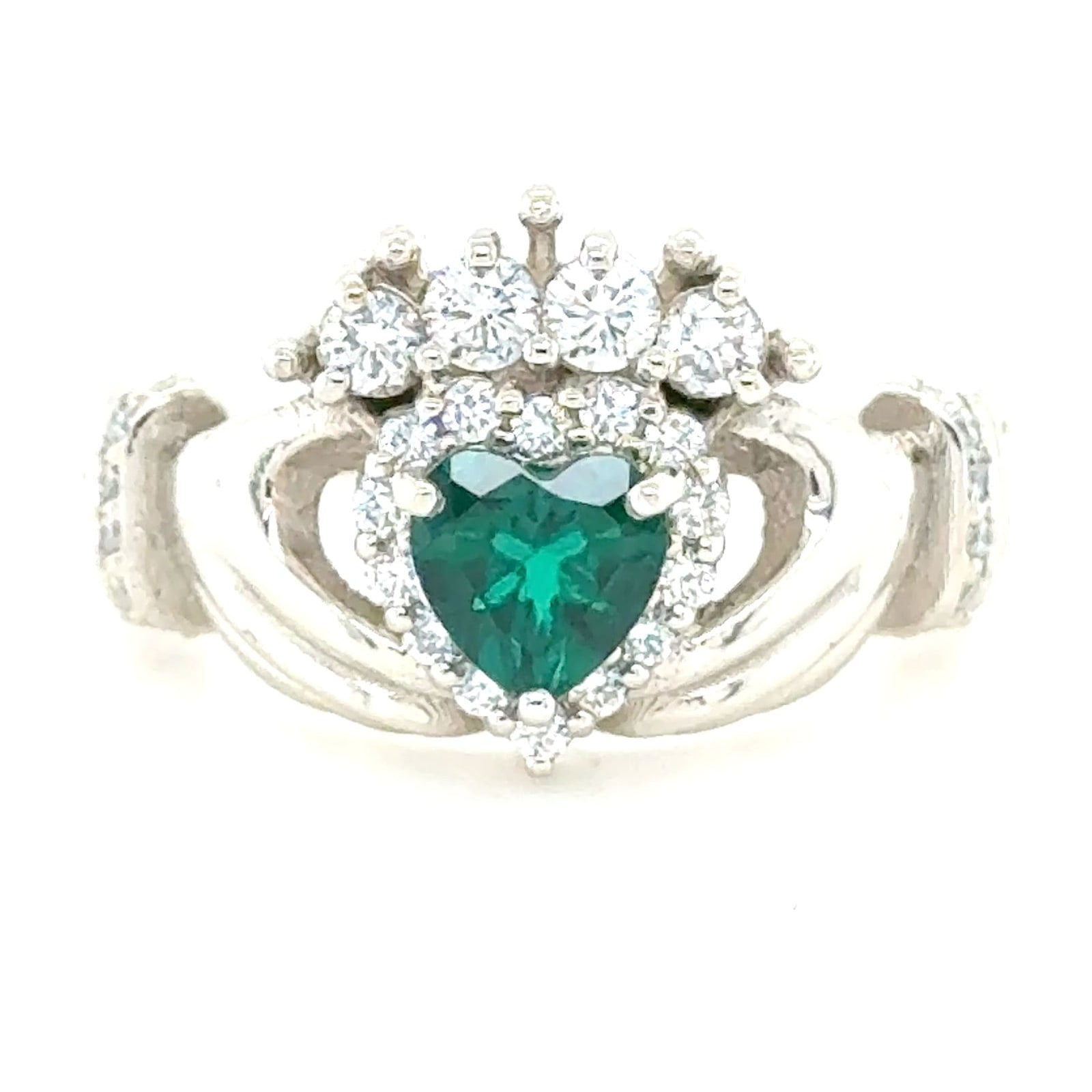 Claddagh ring with green heart-shaped gemstone